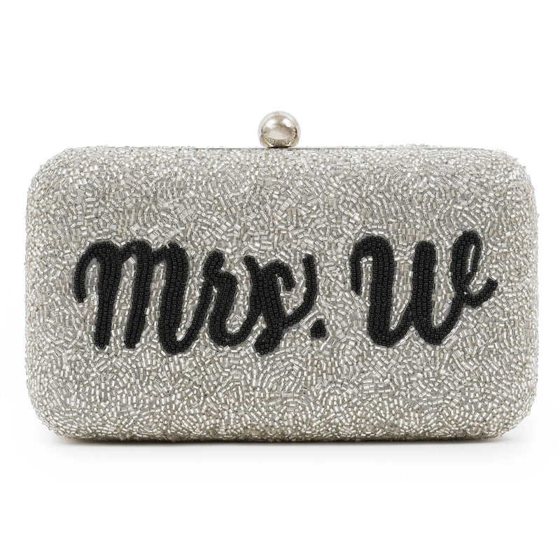 9 Wedding Day Purse Essentials to Carry With You
